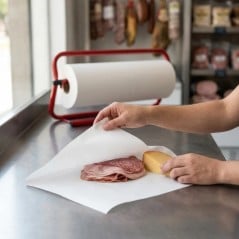 Papel sulfito blanco de 40 cm envolviendo fiambre y queso en fiambrería