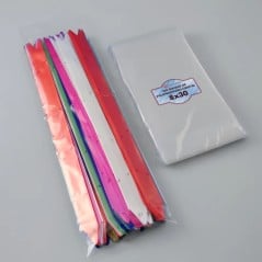 Pack de 100 bolsas de polipropileno cristal 8x30 SonFuertes junto a moños de regalería ya envasados
